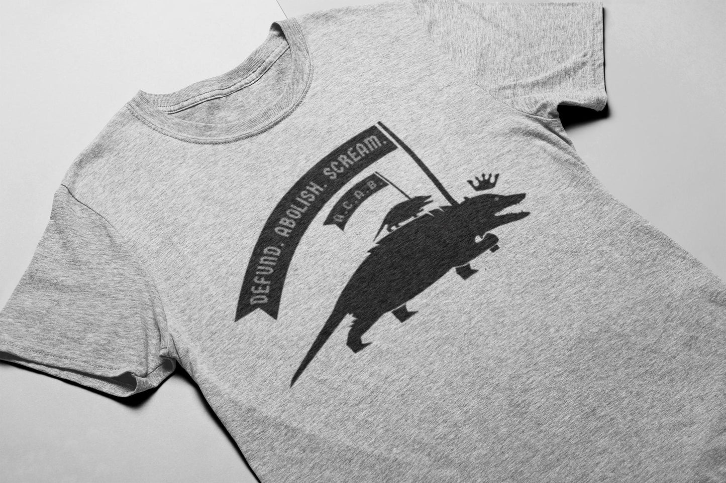 Heathered grey unisex teeshirt with a black emblem of a possum carrying a flag reading "Defund. Abolish. Scream." and a baby possum on its back also carrying a flag reading "A.C.A.B."