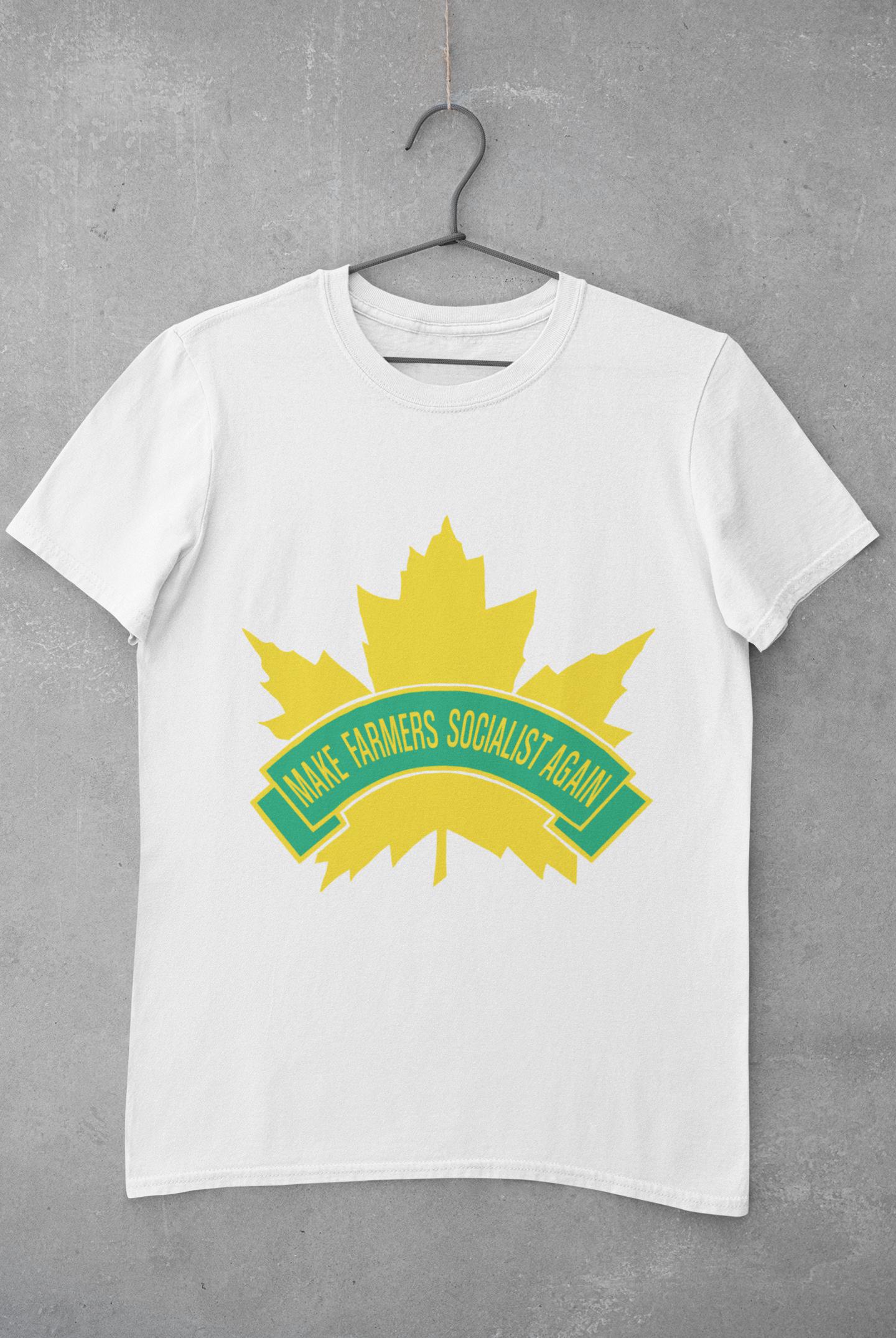 White Tee-Shirt on a hanger, with a the old CCF (Canadian Commonwealth Federation) logo reading "make farmers socialist again"